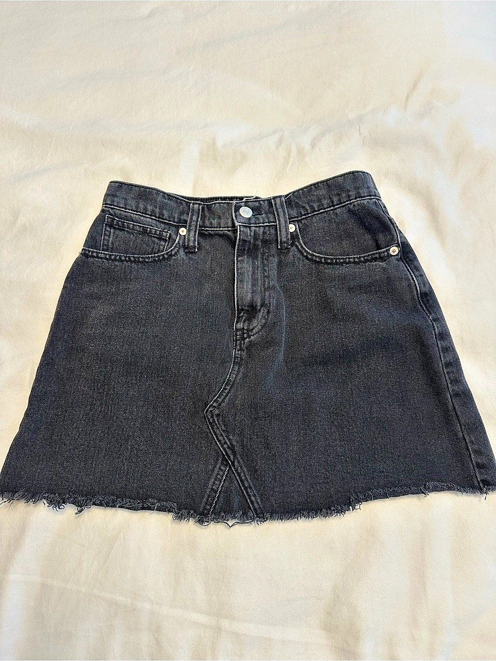 Madewell Denim A-Line Mini Skirt in Washed Black Raw Hem Denim Mini Skirt